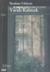  Yaralı Kalmak | Yaralı Kalmak | İbrahim Yıldırım | Yapı Kredi Yayınları ( YKY ) | 9789750809217 